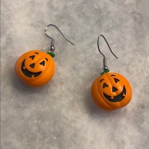 Women’s costume earrings .